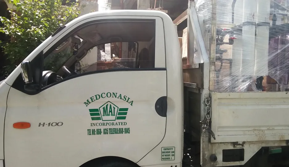 A Medconasia Inc. truck carrying water purification equipment, where Medikonstruk began in 2011